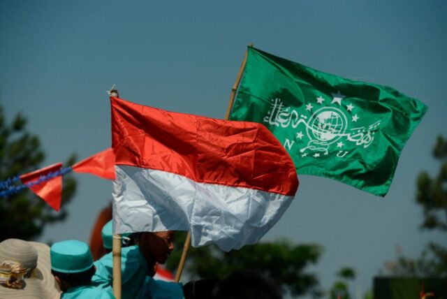 Ilustrasi bendera NU dan bendera merah putih. Sumber: kompas.id